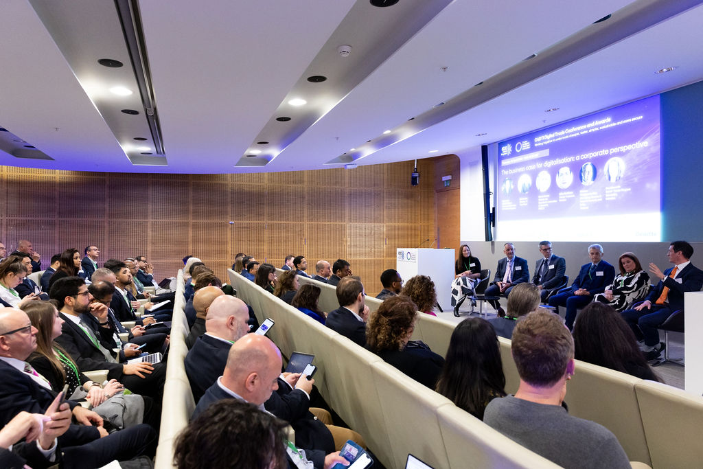 A vie of a lecture style theatre room where the ICC C4DTI Conference took place for 2024.